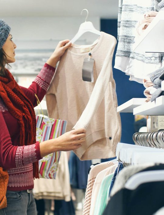 woman-shopping-for-winter-clothes-iStock-492397184