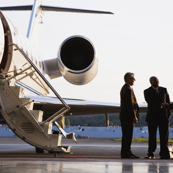 Businesspeople Boarding Executive Jet